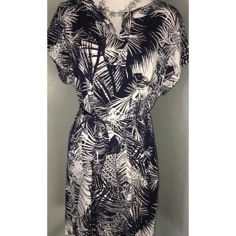 Medium length white and blue dress